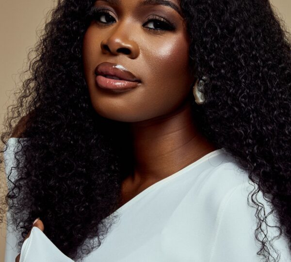 A confident entrepreneur (Adeyoyin Adeleye) representing how creative brands are turning tourism into sustainable Nigerian food industry jobs.