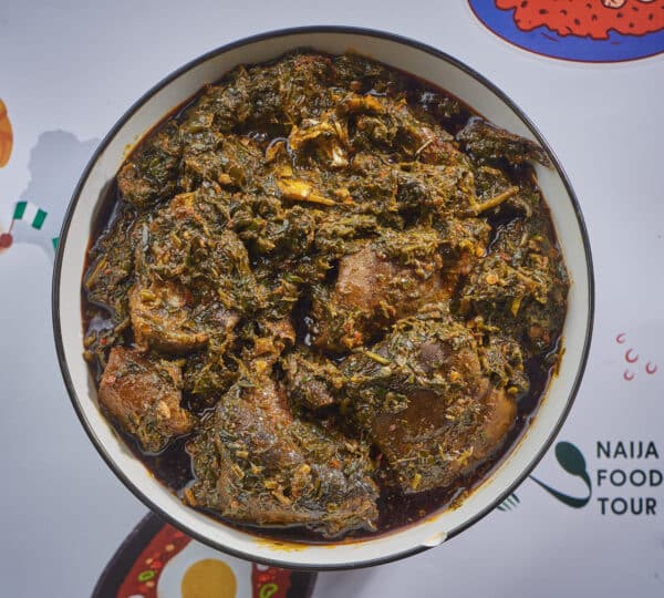 A bowl of Afang soup served with assorted meat – best food in Lagos and authentic Nigerian cuisine by Naija Food Tour