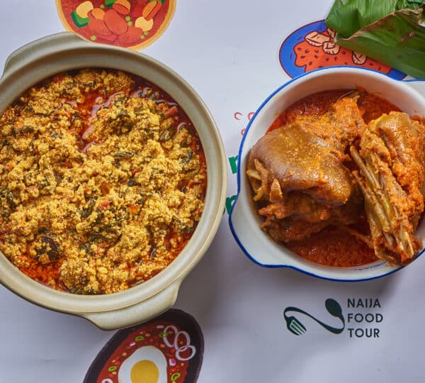 Egusi soup and goat meat served in traditional bowls – authentic Nigerian food from Naija Food Tour Lagos