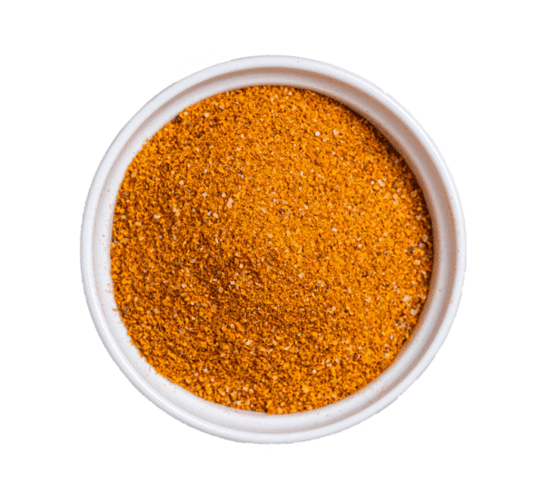 Bowl filled with yaji, the traditional spicy peanut blend used to season Nigerian suya.