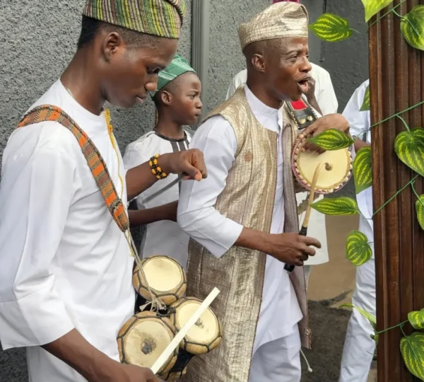 Yoruba musicians performing traditional music, showing the culture fufu and egusi originate from.