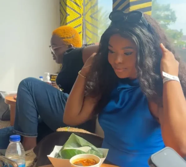 Tourist enjoying a meal during a Naija food tour — one of the fun things to do in Lagos for food lovers and culture seekers.