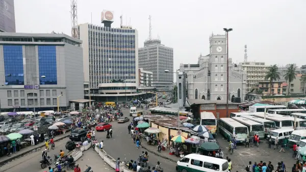 Aerial view of Lagos Island showing Balogun Market and CMS Cathedral during a food tour in Lagos Nigeria.