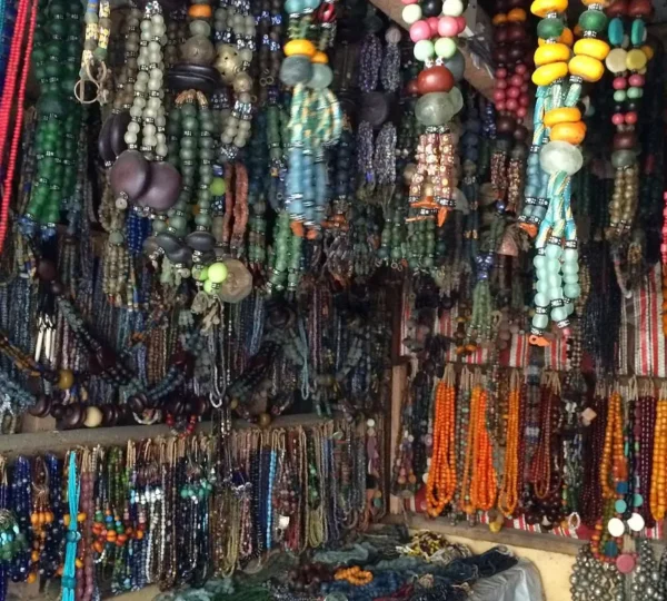 Handmade jewelry and colorful beads displayed at Lekki Arts and Crafts Market — shopping here is one of the unique fun things to do in Lagos.