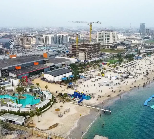 Aerial view of Elegushi Beach in Lagos filled with people enjoying the sunshine — one of the best fun things to do in Lagos.